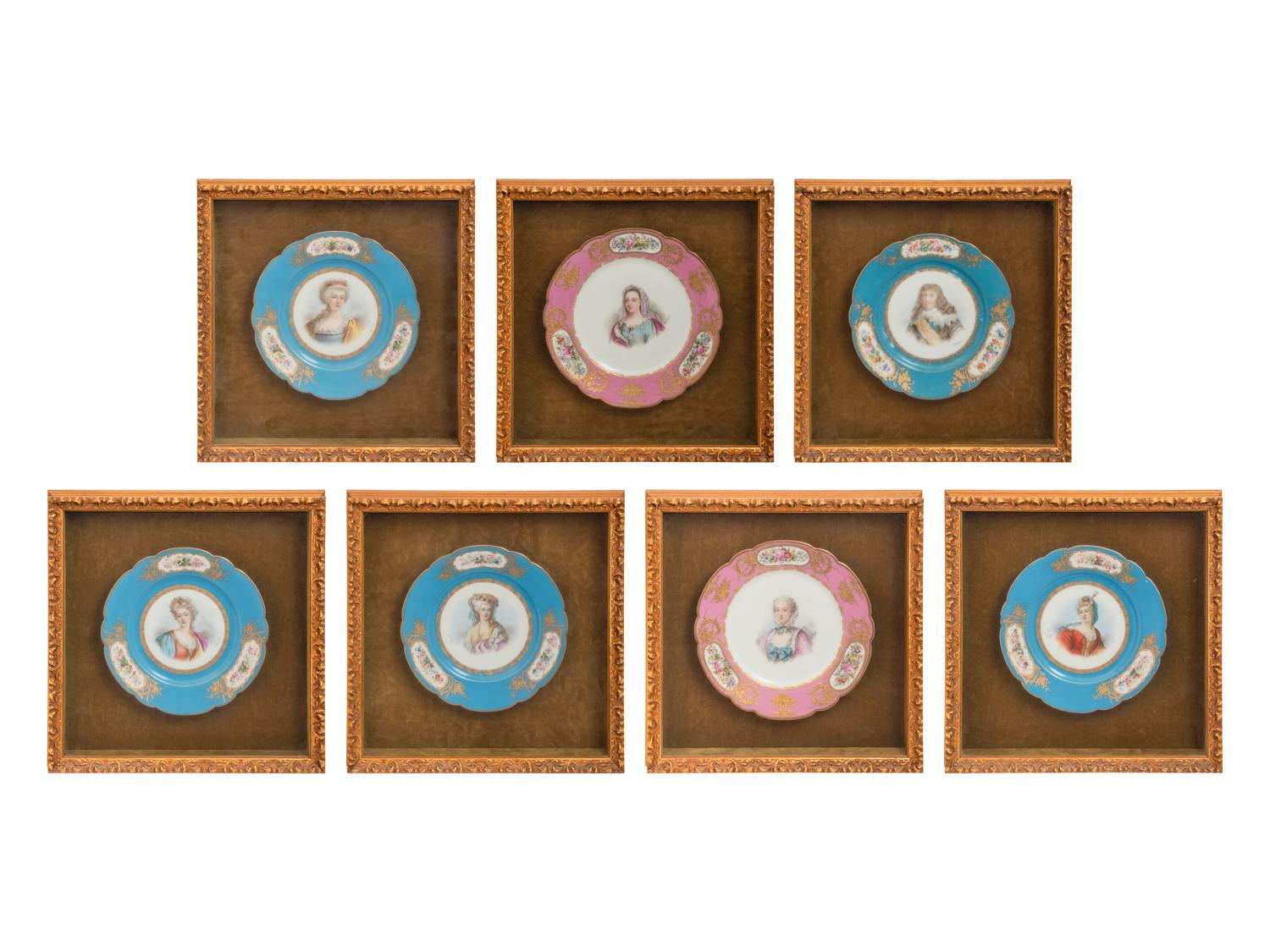 A Group of Seven Framed Sèvres Style Porcelain Plates