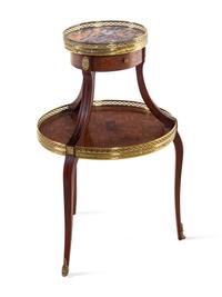 A Louis XV/XVI Two Tiered Mahogany Table