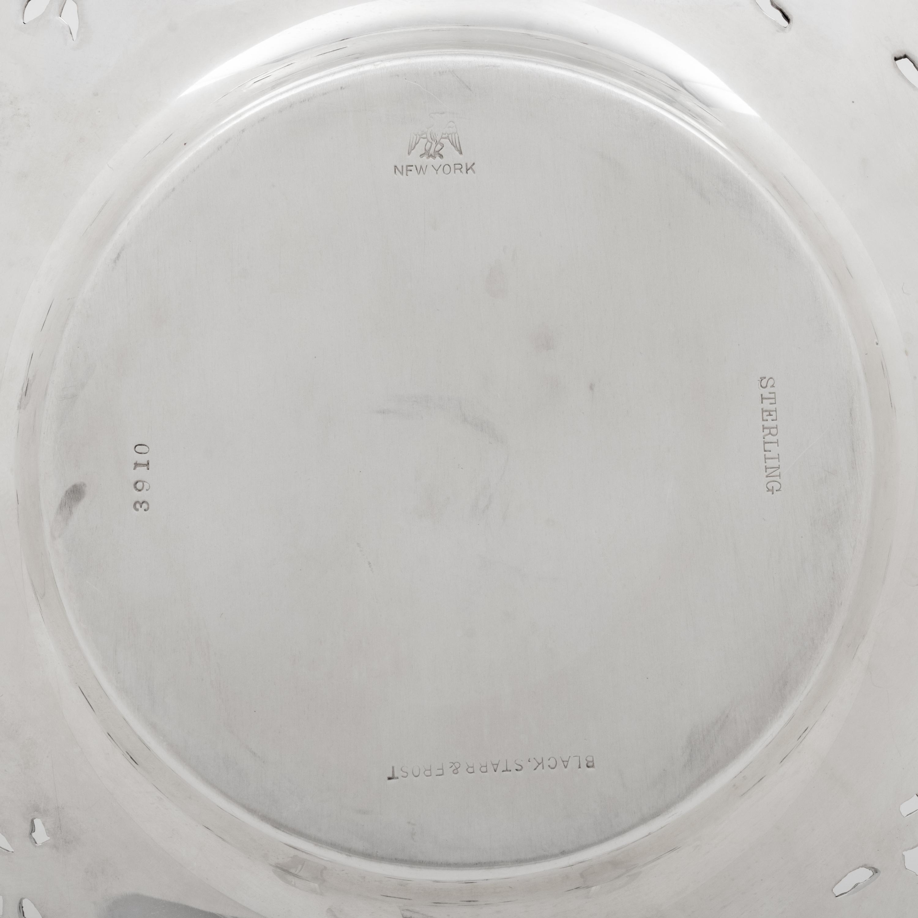 A Set of Eleven American Silver Bread Plates