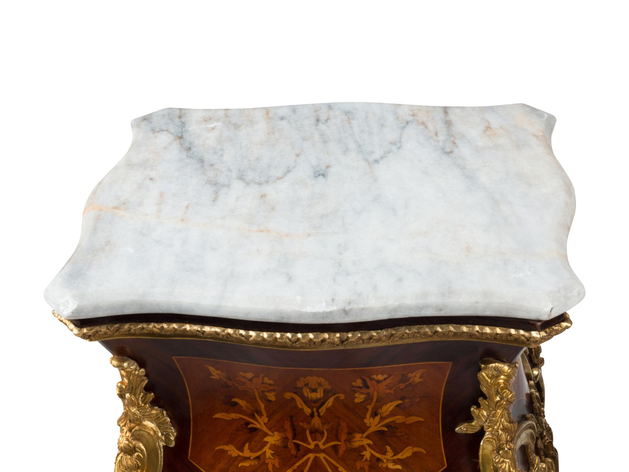 A Pair of Louis XV Style Gilt Bronze Mounted Marquetry Pedestals