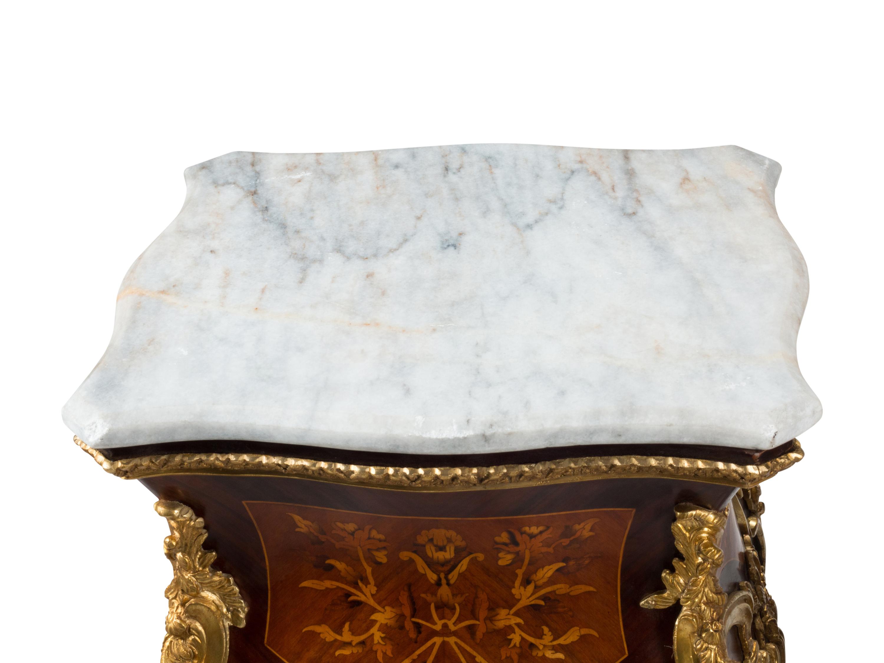 A Pair of Louis XV Style Gilt Bronze Mounted Marquetry Pedestals