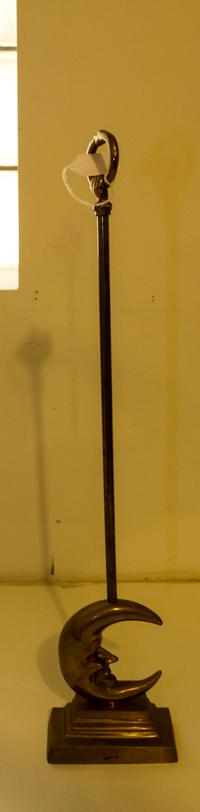 A Gilt Metal Doorstop Height 24 inches.