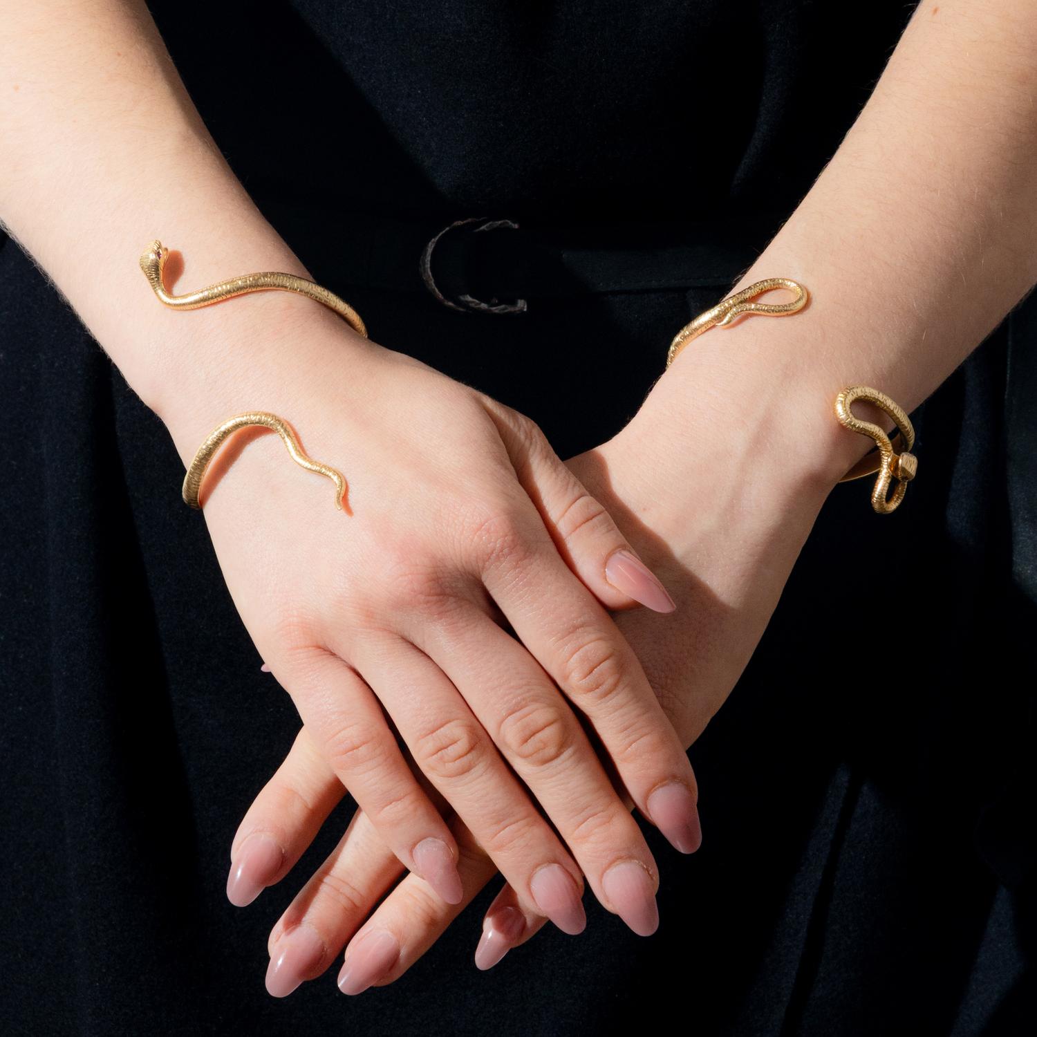 VERDURA, PAIR OF YELLOW GOLD AND RUBY 'MEDUSA' SERPENT CUFF BRACELETS