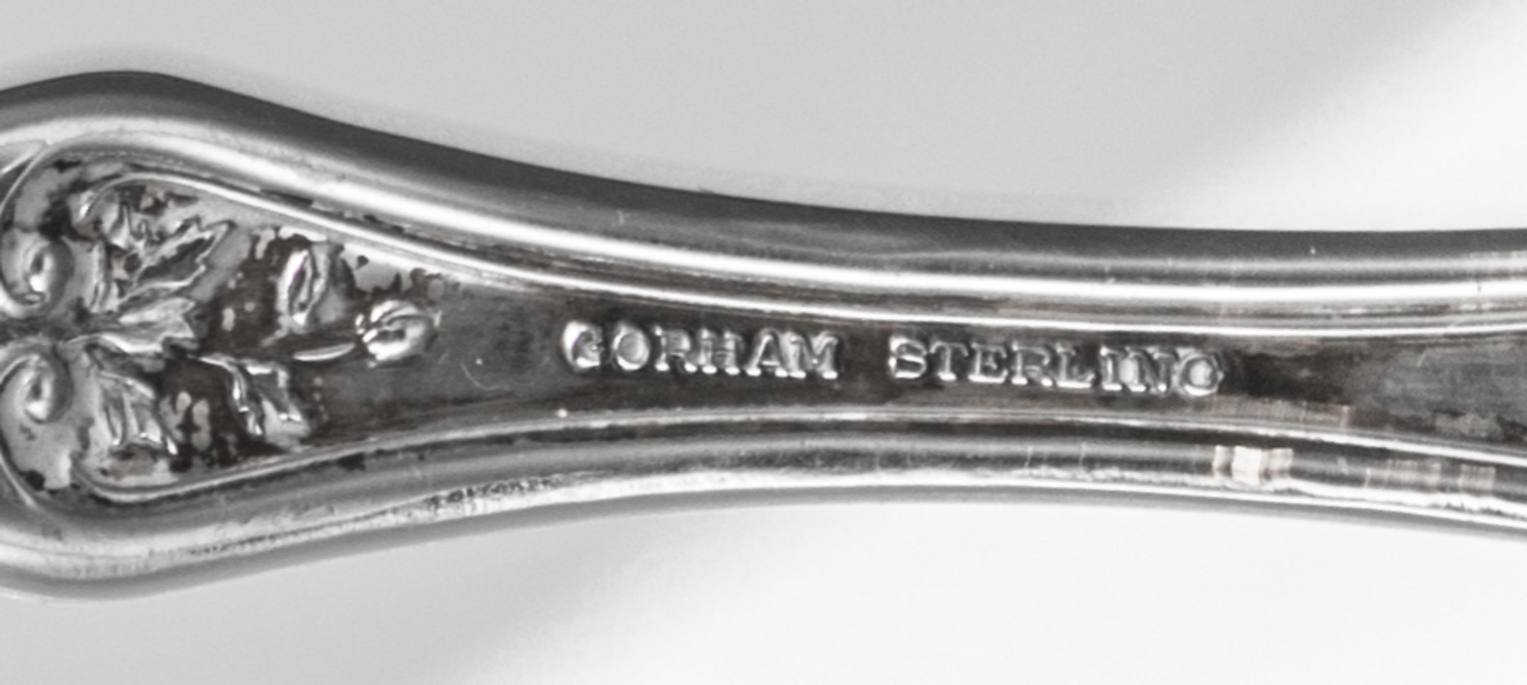 An American Silver Flatware Service, Gorham Mfg. Co., Providence, RI, Blossom pattern, comprising: 12 dinner knives 12 dinner forks 12