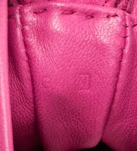 An Hermes Rose Tyrien Agneau Clou de Selle Pouch, 6" x 9" x 1".