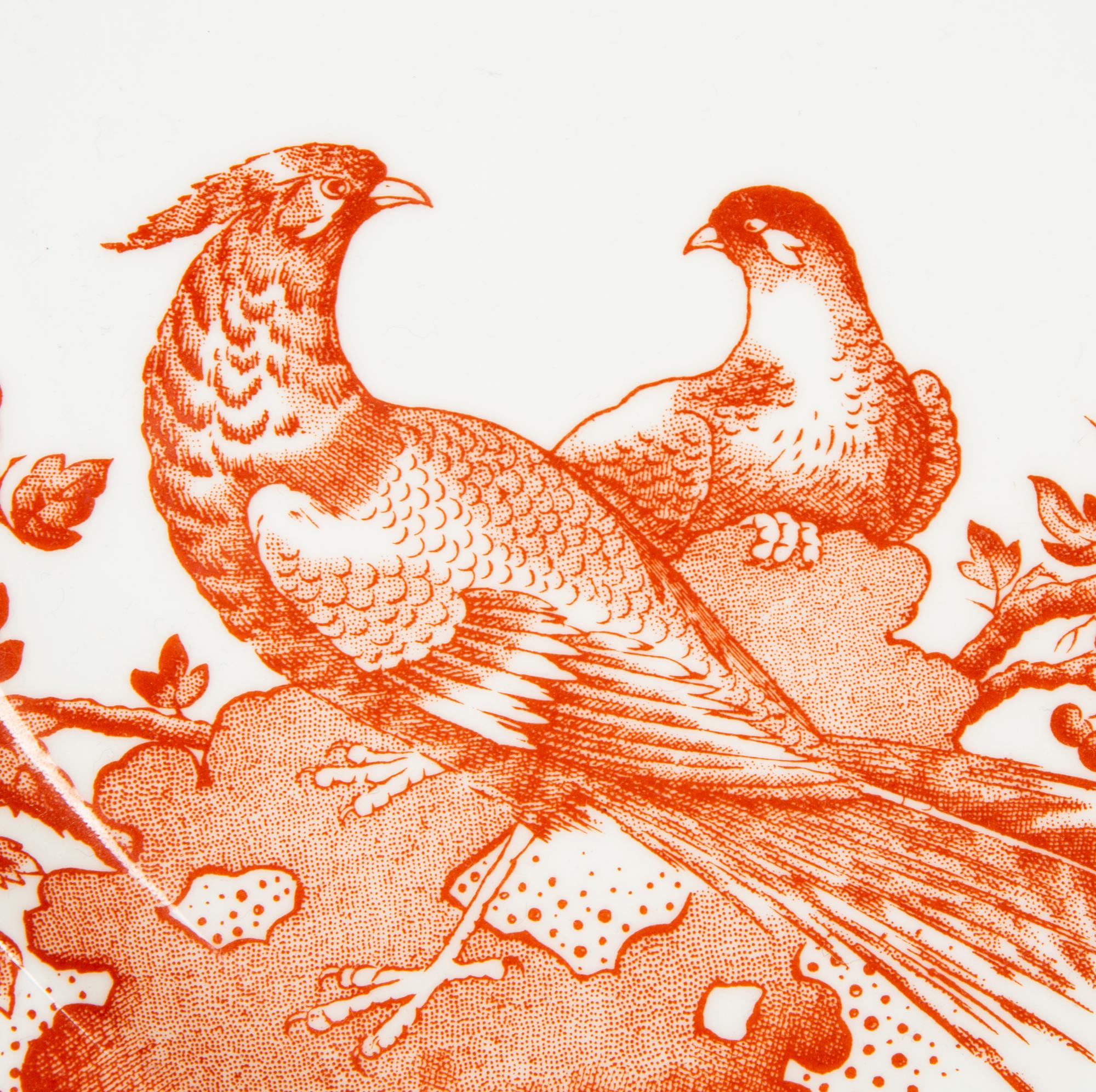 A Royal Crown Derby Red Aves Covered Tureen with Under Plate and a Pair of Candlesticks