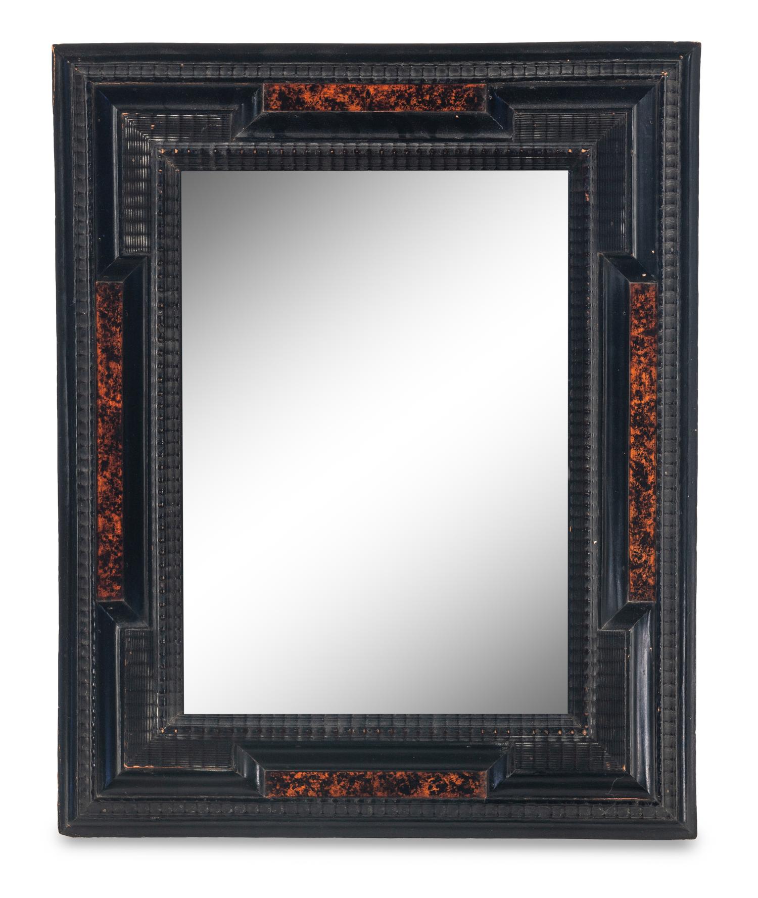 A Flemish Faux Tortoiseshell and Ebonized Ripple-Molded Mirror