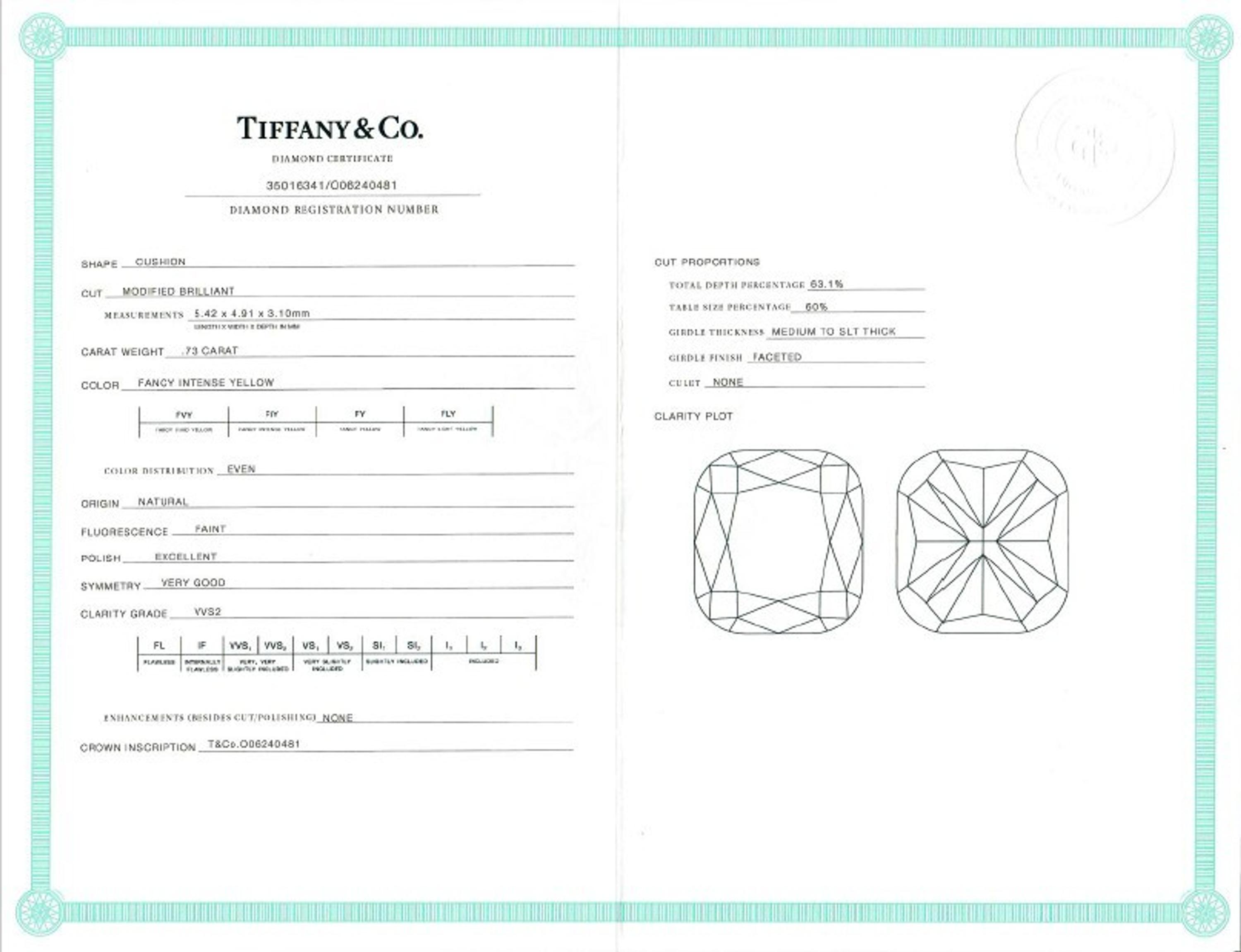 TIFFANY & CO., 'SOLESTE' FANCY INTENSE YELLOW DIAMOND AND DIAMOND STUD EARRINGS