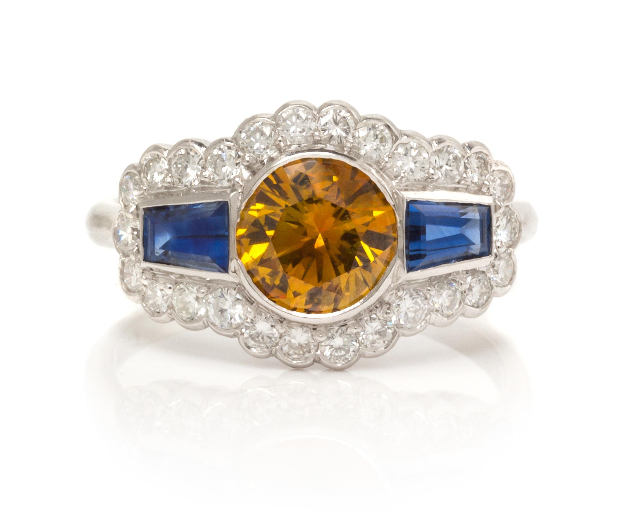 An 18 Karat White Gold, Colored Diamond, Sapphire and Diamond Ring, 2.70 dwts.