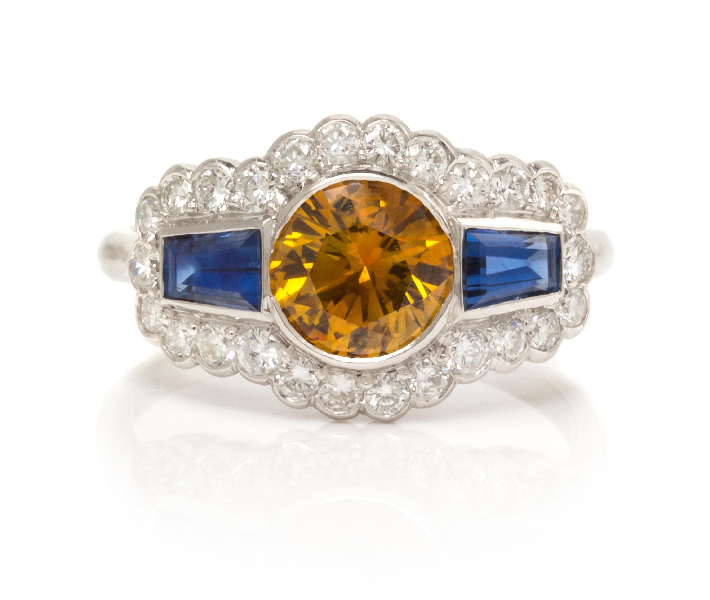 An 18 Karat White Gold, Colored Diamond, Sapphire and Diamond Ring, 2.70 dwts.