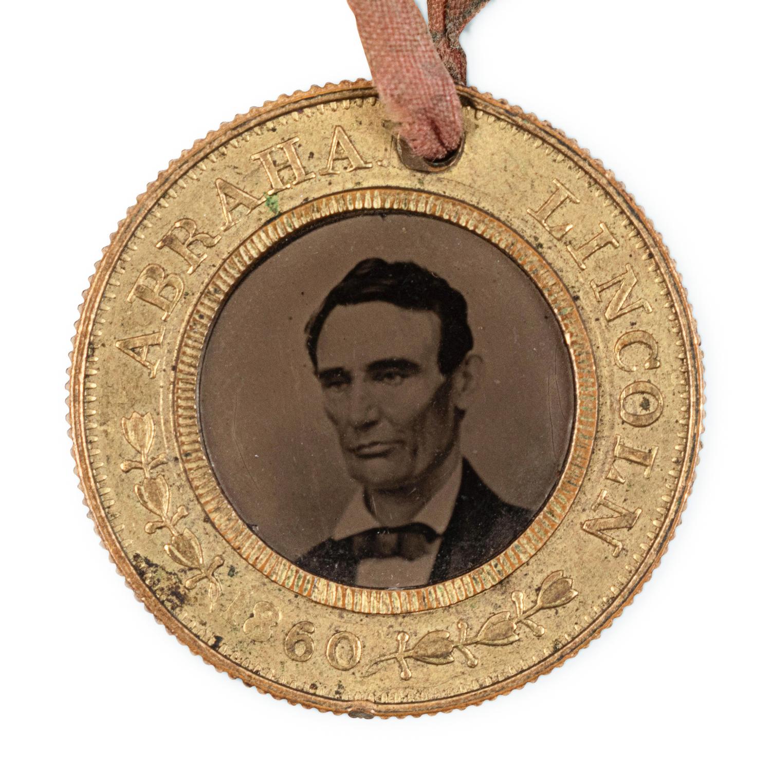 [LINCOLN-HAMLIN CAMPAIGN]. A presidential campaign token featuring ferrotype portraits of Lincoln and Hamlin, ca. 1860.