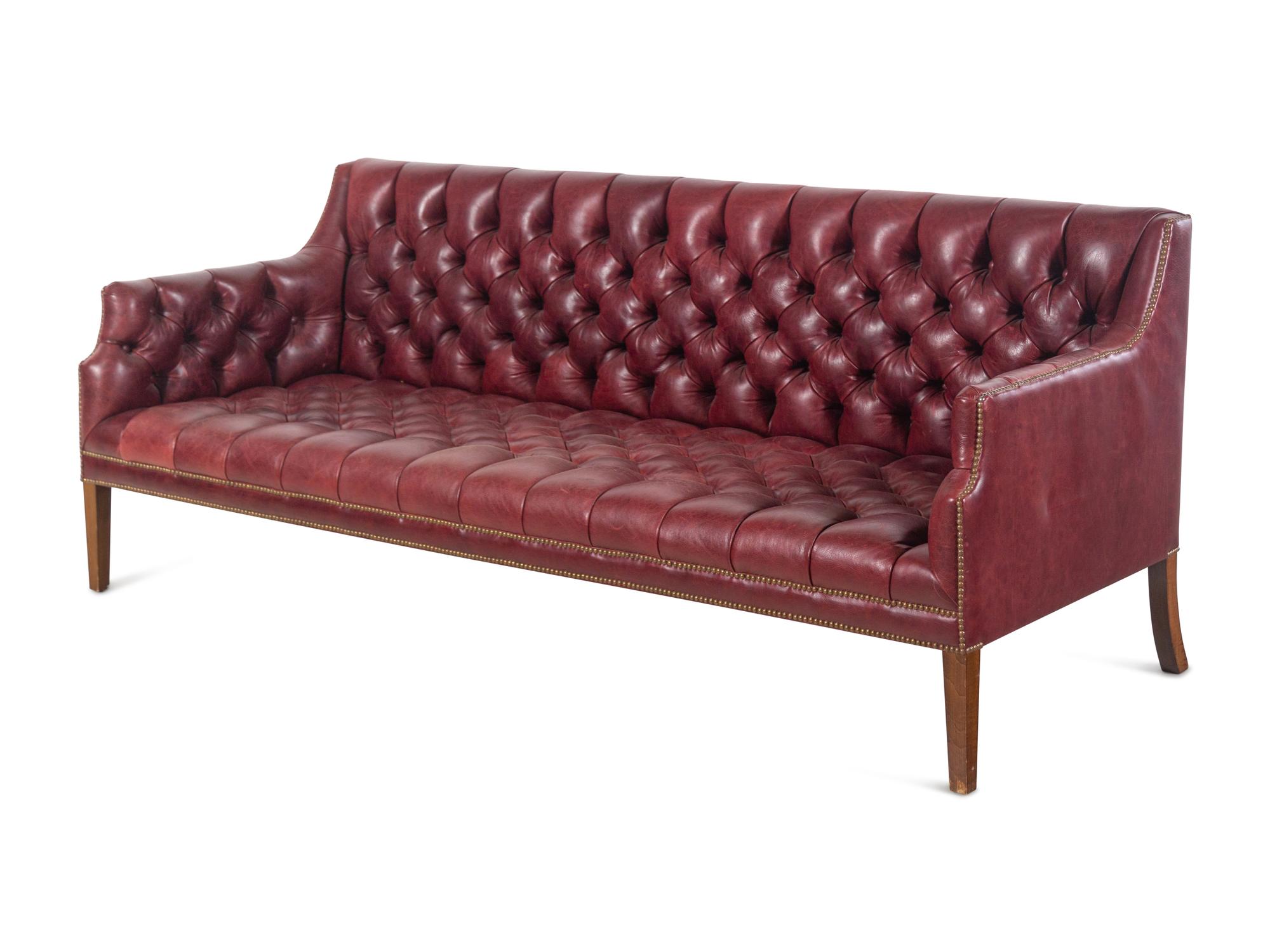 A Pair of English Button-Tufted Leather Sofas