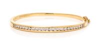 A 14 Karat Yellow Gold and Diamond Bangle Bracelet,
