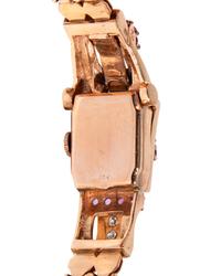 RETRO, RUBY, DIAMOND, AND ROSE GOLD SURPRISE WATCH