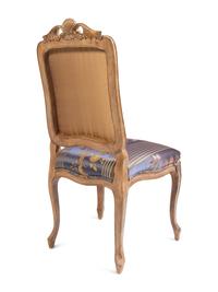 A Set of Twelve Louis XV Style Giltwood Dining Chairs