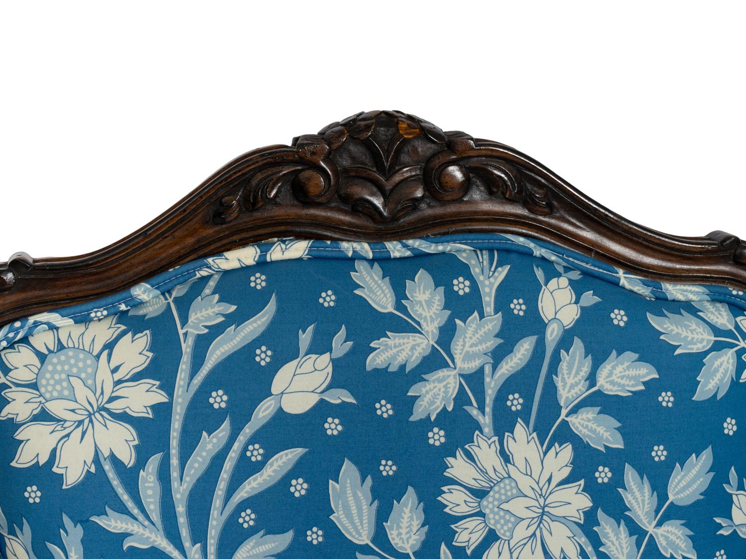 A Pair of Louis XV Style Walnut Fauteuils