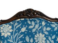 A Pair of Louis XV Style Walnut Fauteuils
