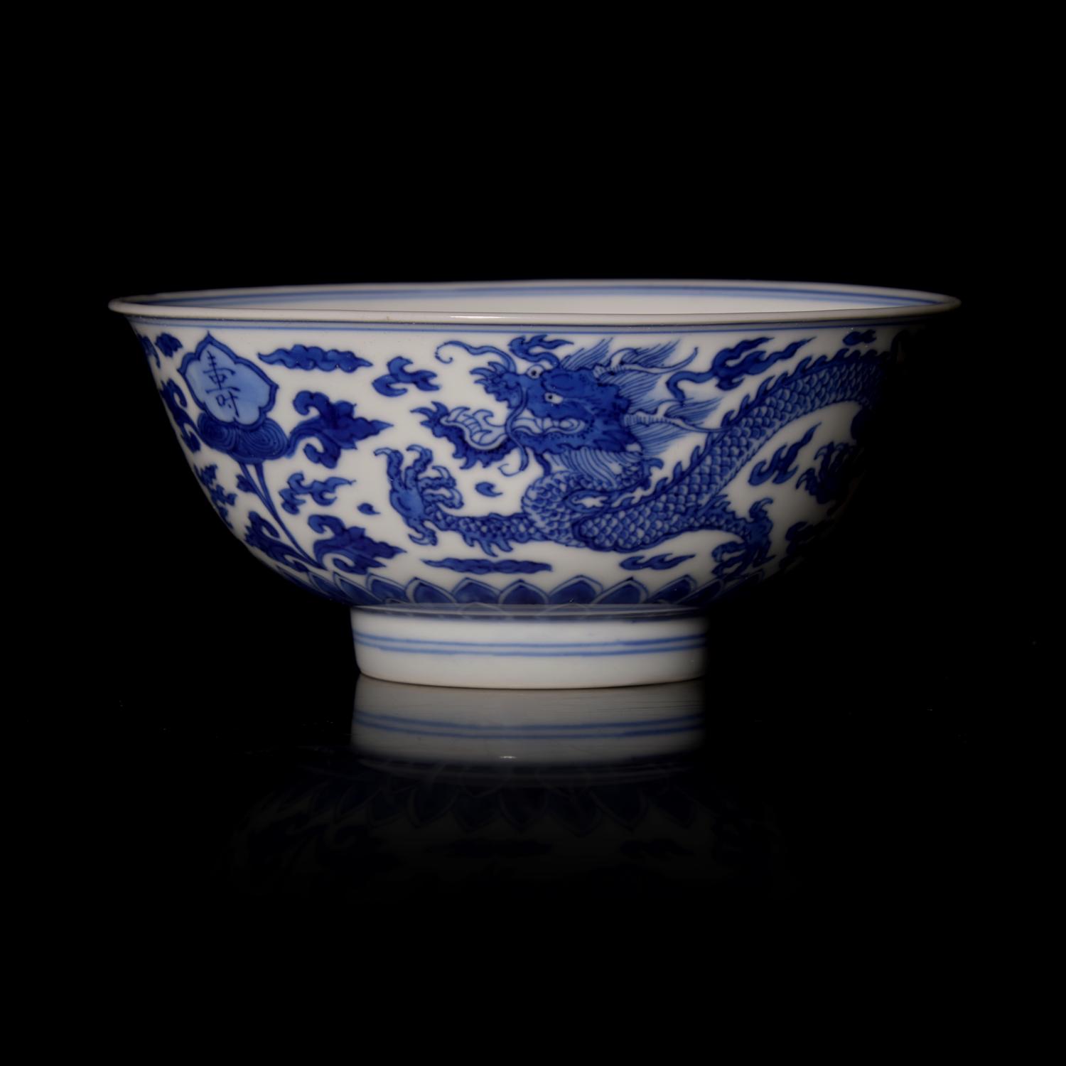 An Imperial Chinese Blue and White Porcelain 'Dragon' Bowl, Kangxi Six-Character Mark and of the Period 清康熙 青花福壽雲龍紋盌《大清康熙年製》款