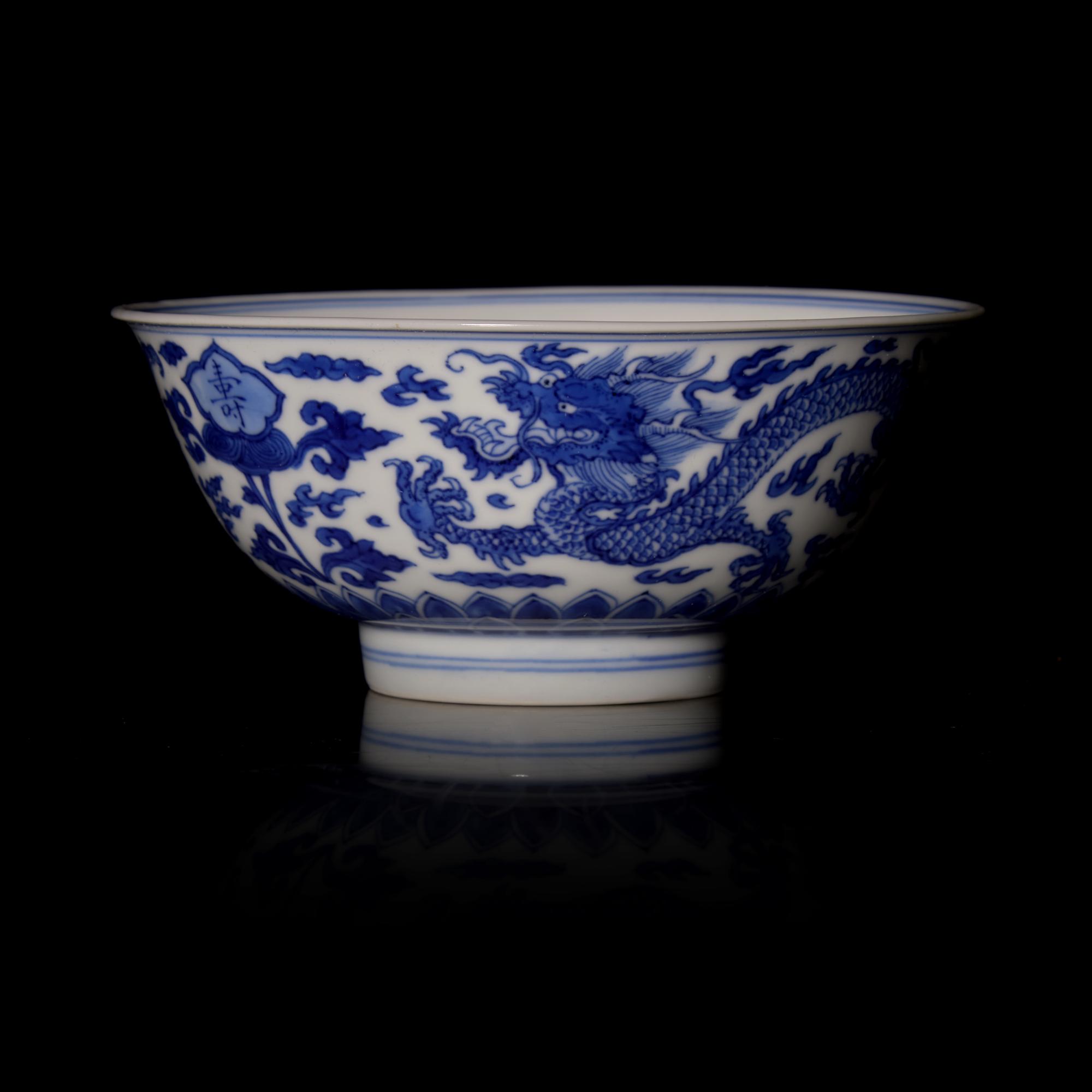 An Imperial Chinese Blue and White Porcelain 'Dragon' Bowl, Kangxi Six-Character Mark and of the Period 清康熙 青花福壽雲龍紋盌《大清康熙年製》款