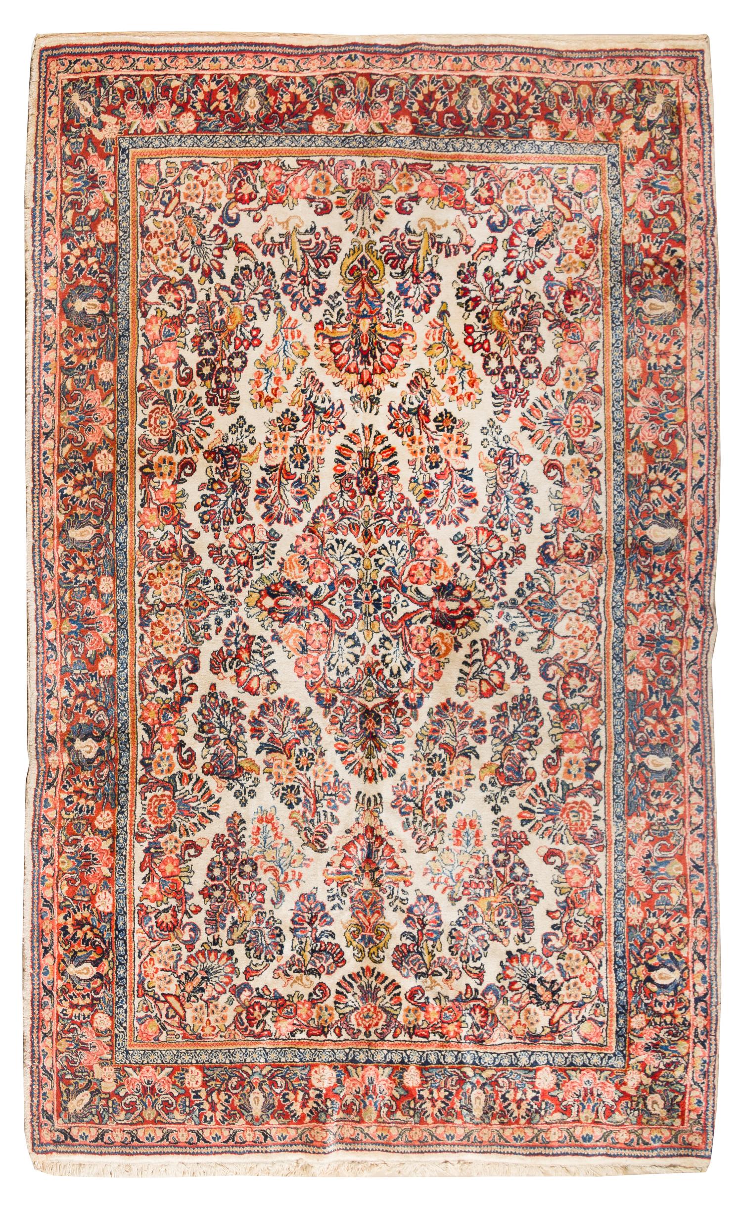 A Sarouk Wool Rug 8 feet 11 inches x 6 feet 3 inches. — CIRCA 1920
