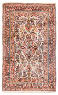 A Sarouk Wool Rug 8 feet 11 inches x 6 feet 3 inches. — CIRCA 1920