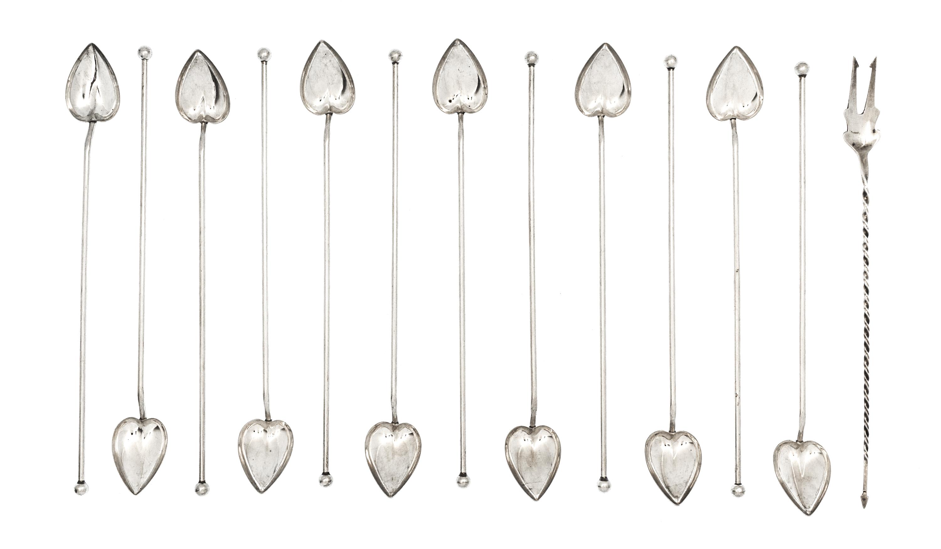 A Set of Twelve American Silver Cocktail Stirs, , having a heart form bowl and knopped end, together with a silver pickle fork