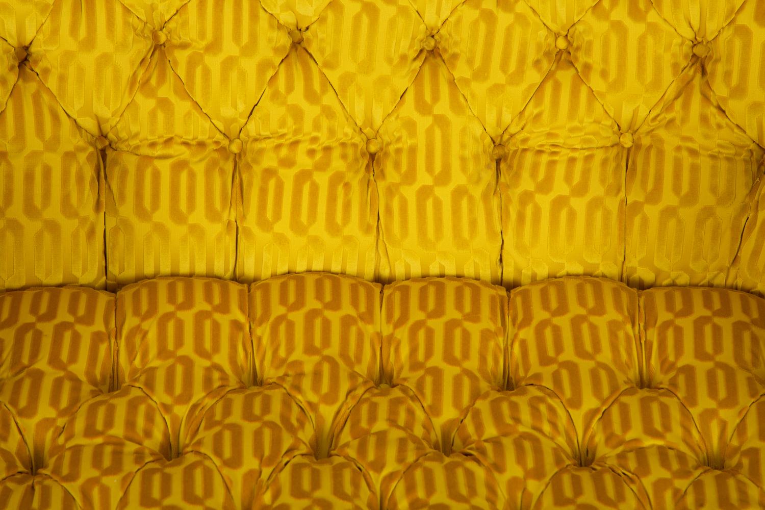 A Pair of Button Tufted Sofas