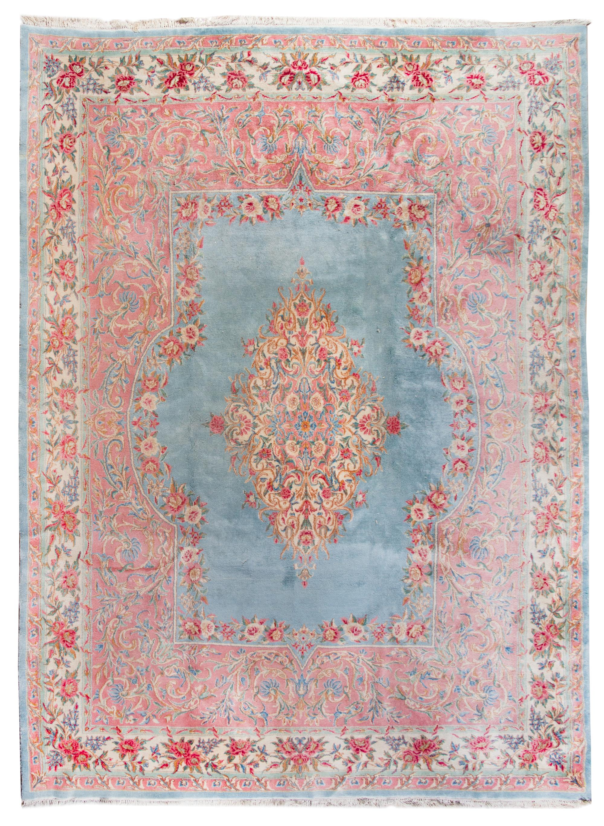 A Kirman Wool Rug 12 feet 4 inches x 8 feet 10 inches. — MID-20TH CENTURY