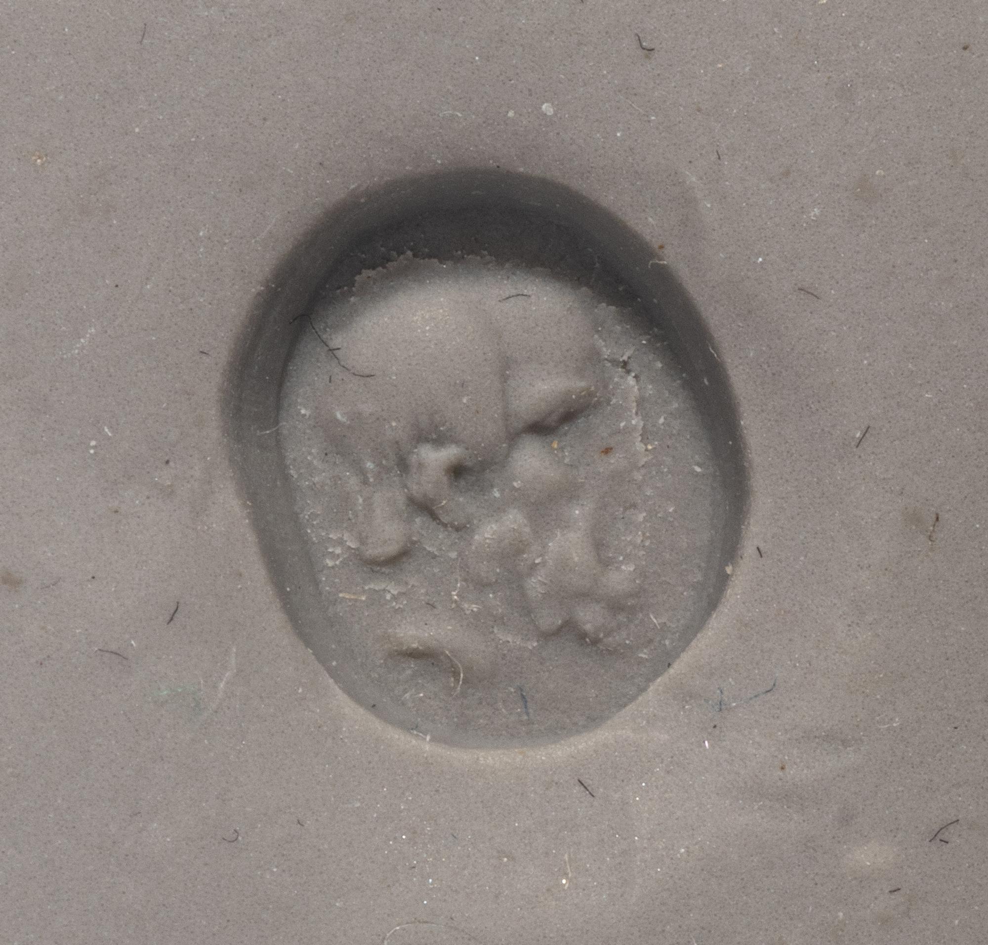 A Roman Plasma Ring Stone with a Portrait Head of Socrates