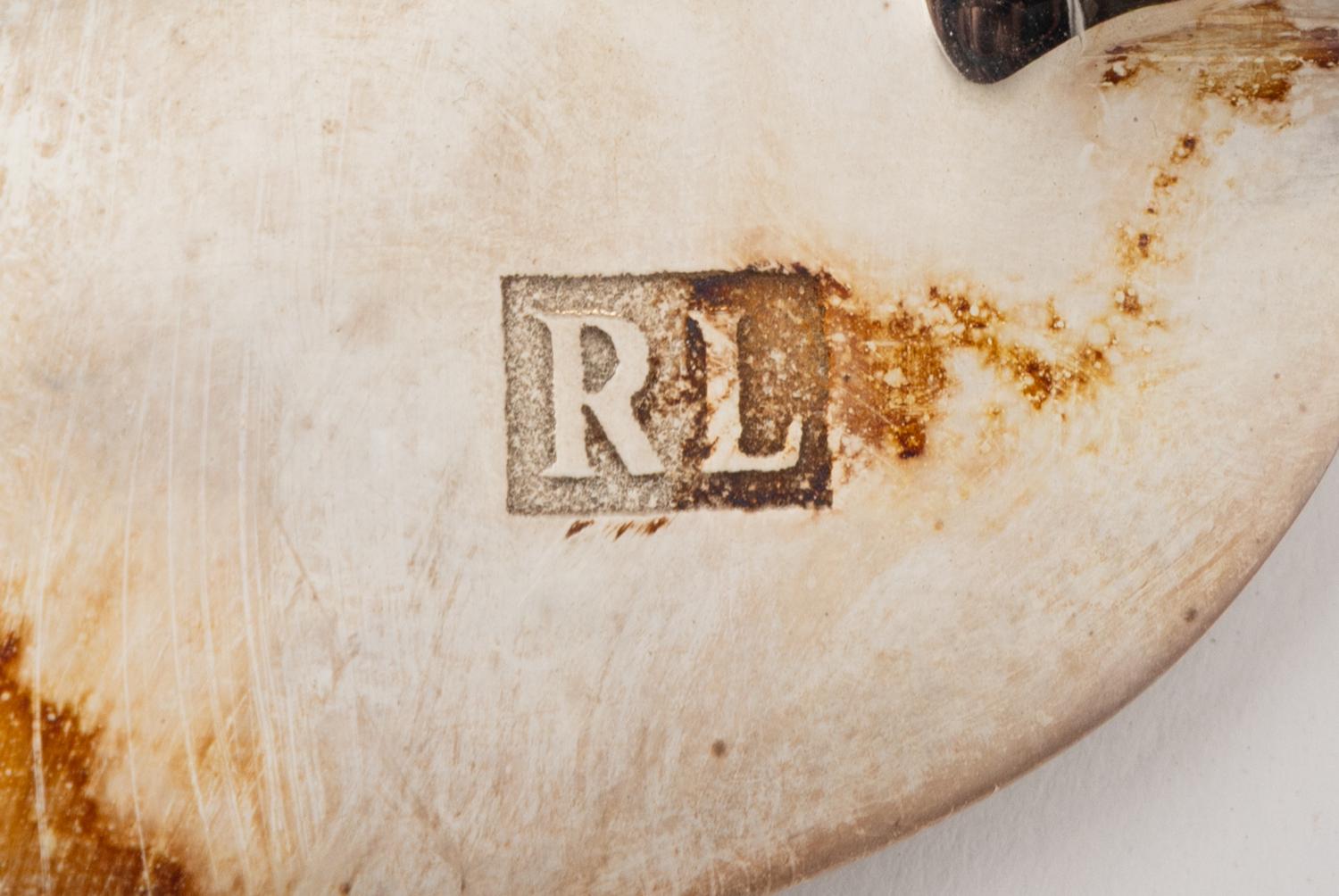 A Pair of Ralph Lauren Silver-Plate and Leather Stirrup-Form Bookends