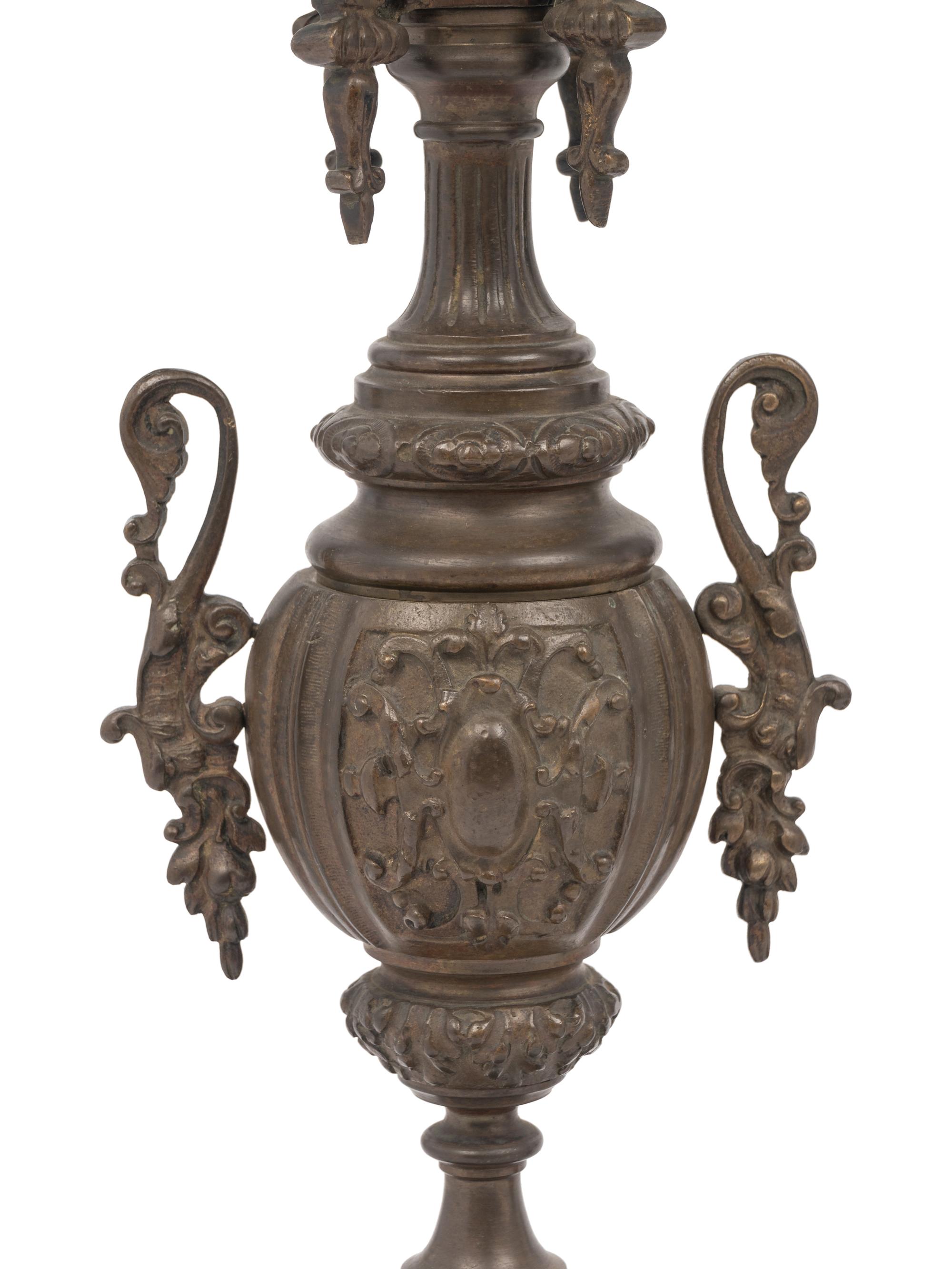 A Pair of French Neoclassical Bronze Four-Light Candelabra