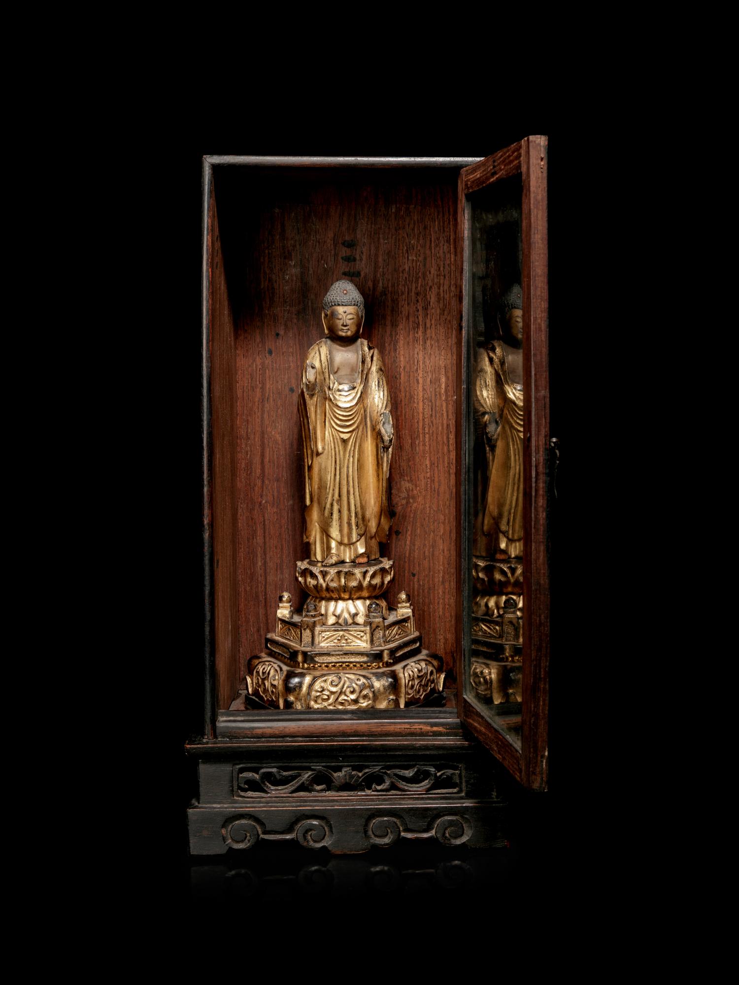 A Hardwood Shrine with a Gilt Wood Figure of Buddha