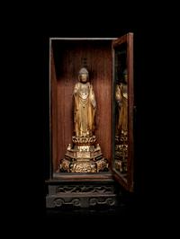 A Hardwood Shrine with a Gilt Wood Figure of Buddha