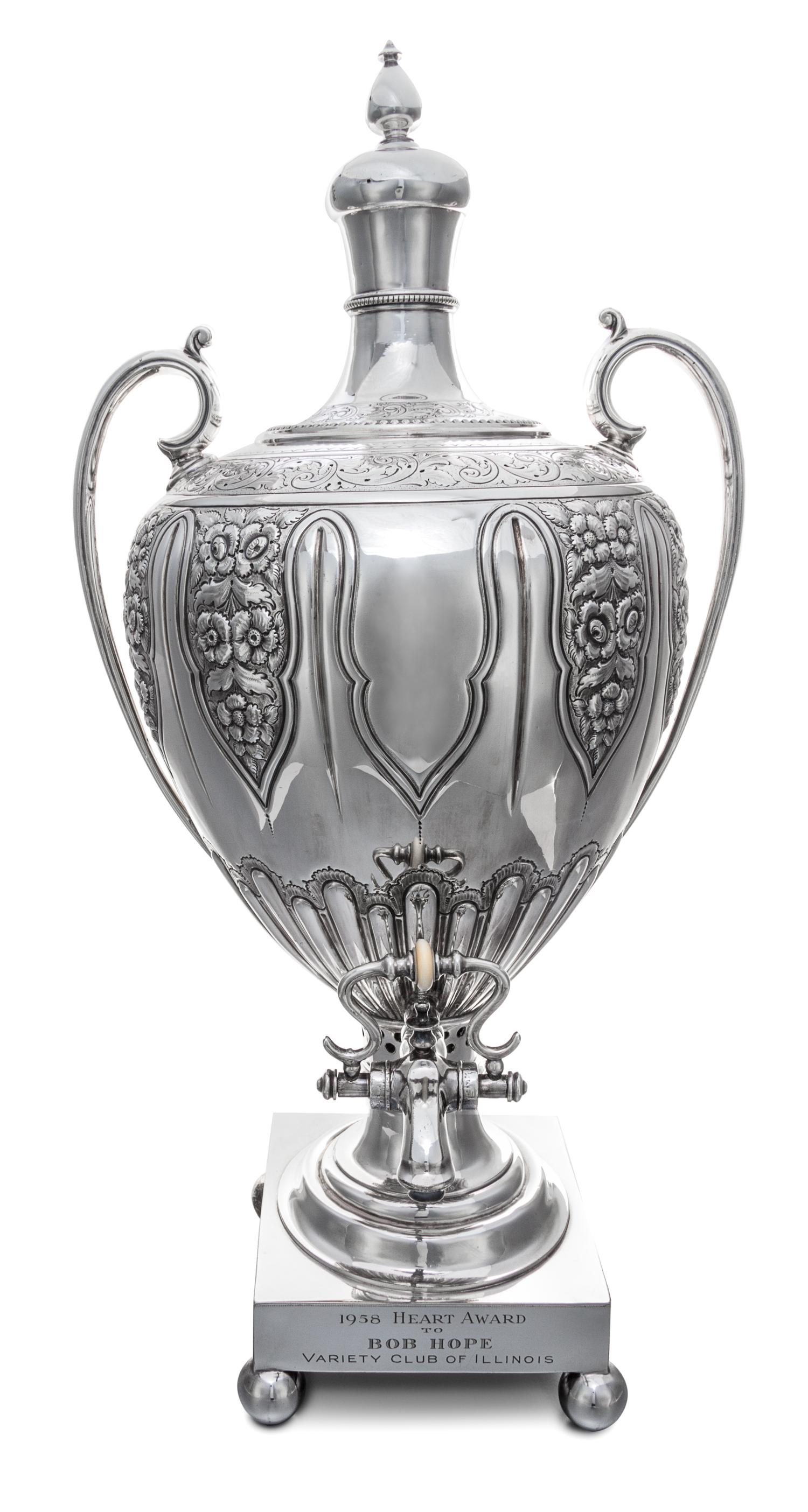 An English Silver-Plate Coffee Urn, , of baluster form with top finial, the base with engraved inscription 1958 Heart Award/ to BOB HOP