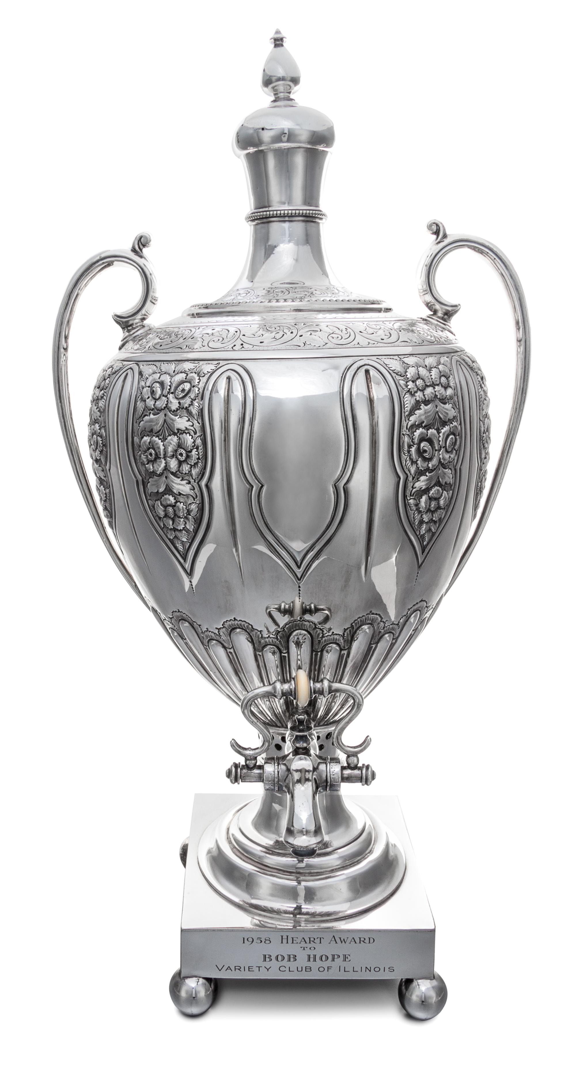 An English Silver-Plate Coffee Urn, , of baluster form with top finial, the base with engraved inscription 1958 Heart Award/ to BOB HOP