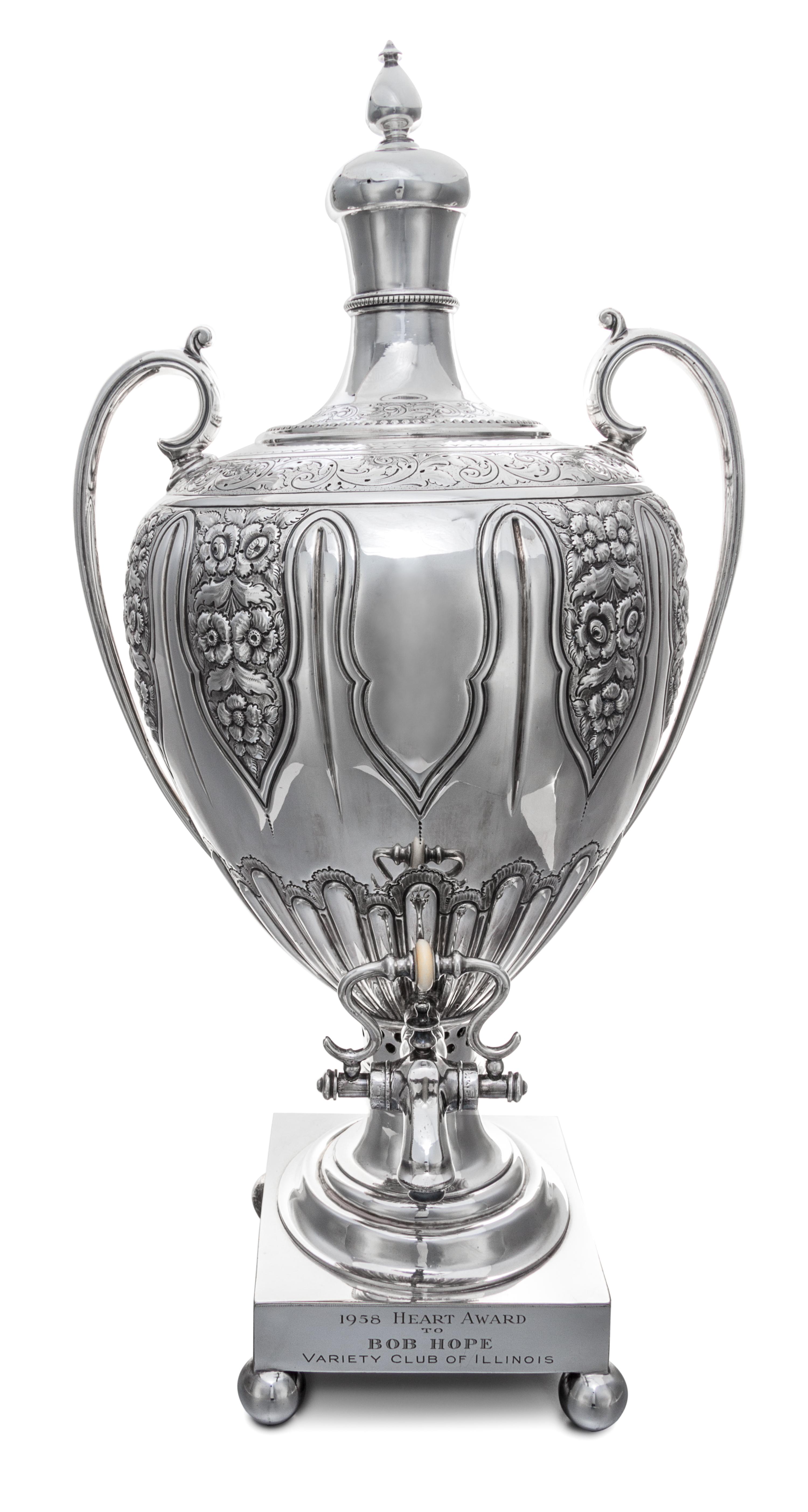 An English Silver-Plate Coffee Urn, , of baluster form with top finial, the base with engraved inscription 1958 Heart Award/ to BOB HOP