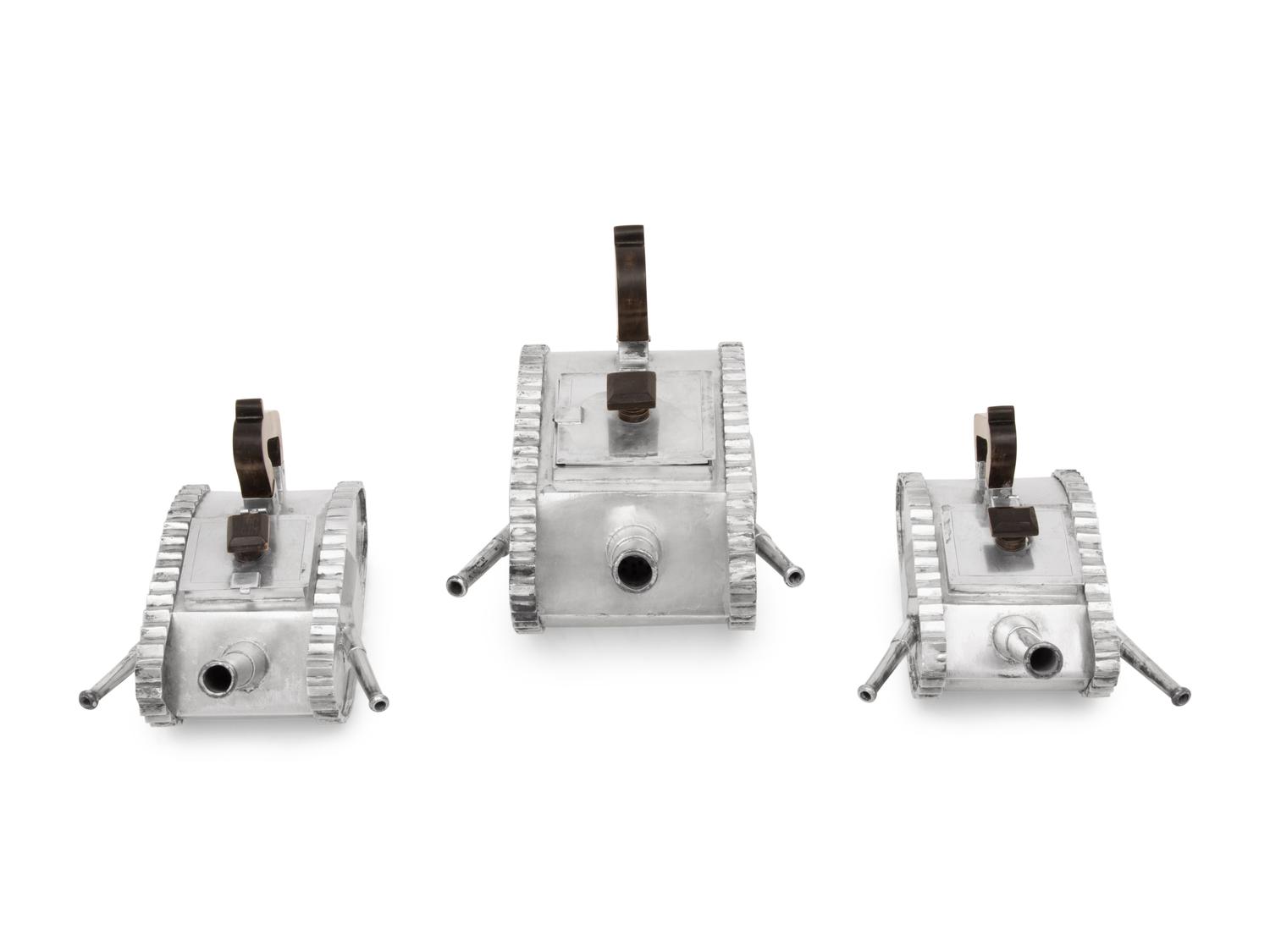 An American Silver Three-Piece Tea Service in the Form of Armored Tanks