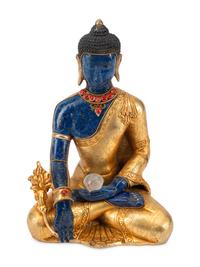 A Tibetan Style Gilt Bronze and Lapis Lazuli Seated Deity