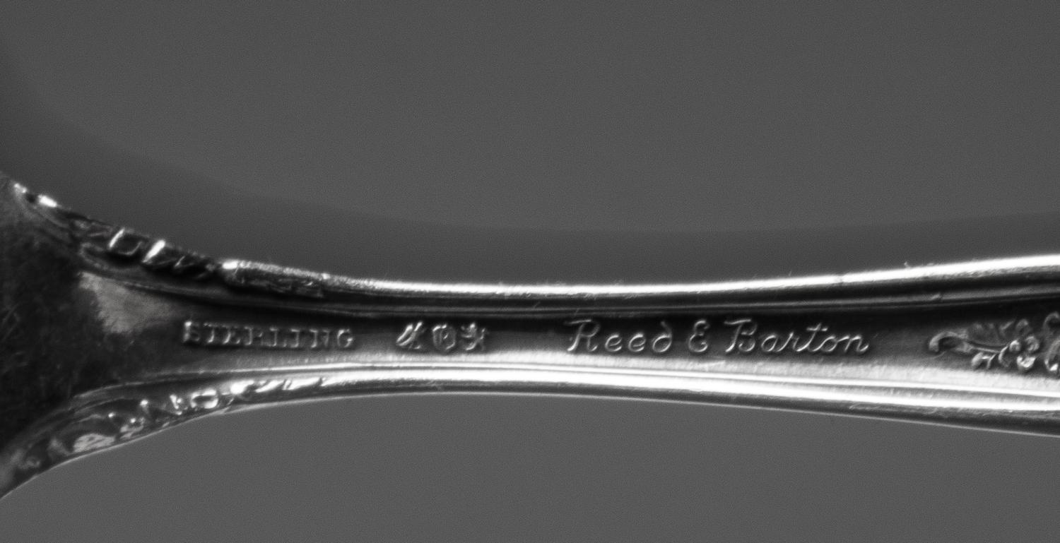 An American Silver Flatware Service, Reed and Barton, Taunton, MA, French Renaissance pattern, comprising: 10 dinner knives 5 luncheon