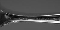 An American Silver Flatware Service, Reed and Barton, Taunton, MA, French Renaissance pattern, comprising: 10 dinner knives 5 luncheon