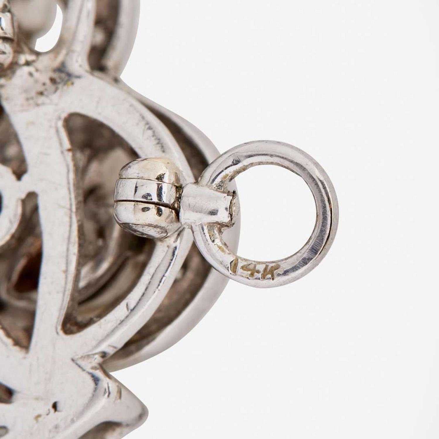 An 18K Yellow Gold and Diamond Brooch