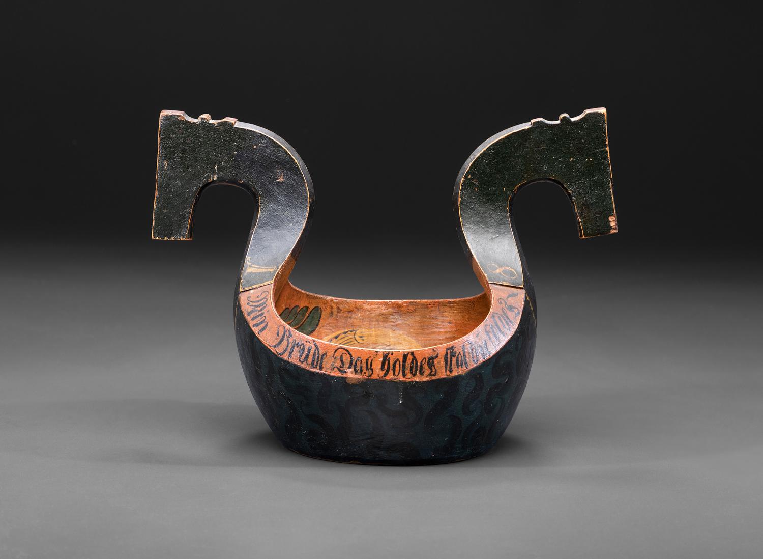 A Scandinavian Carved and Painted Wood Ale Bowl
