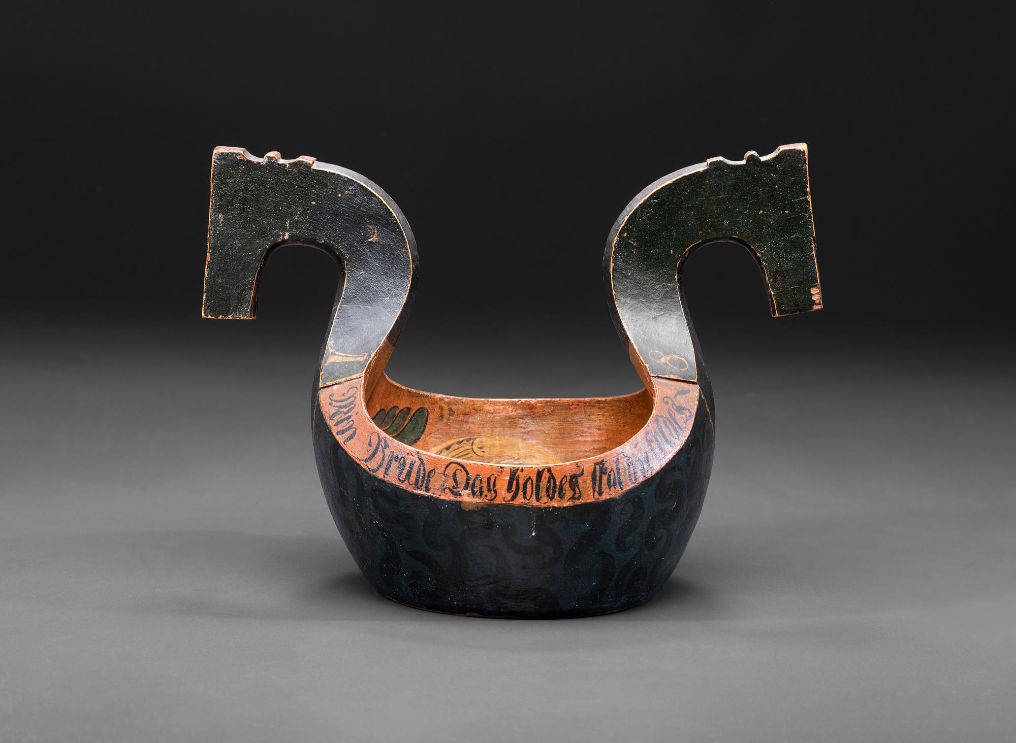 A Scandinavian Carved and Painted Wood Ale Bowl