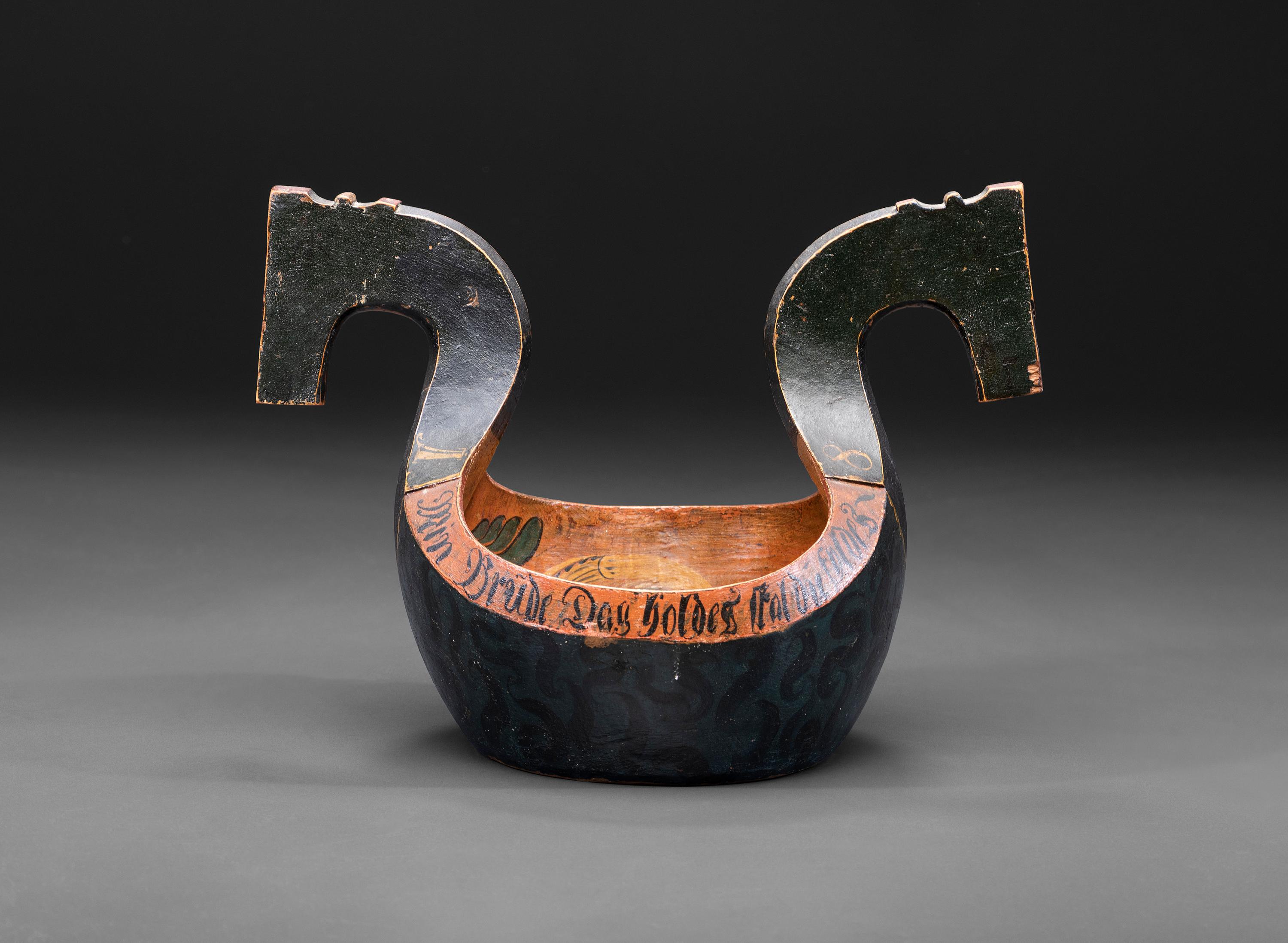A Scandinavian Carved and Painted Wood Ale Bowl
