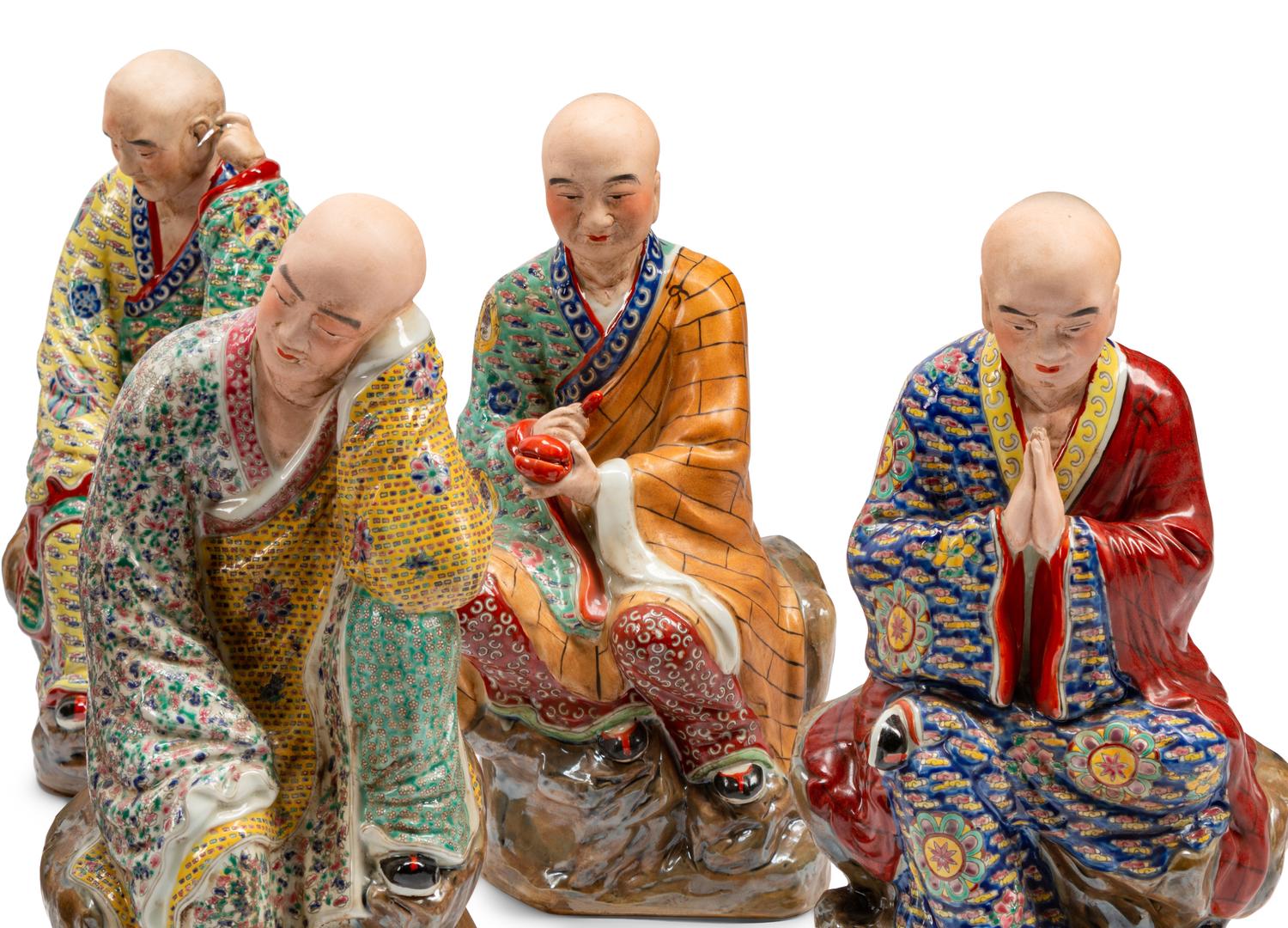 A Set of Eighteen Chinese Export Enameled Porcelain Figures of Immortals