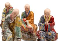 A Set of Eighteen Chinese Export Enameled Porcelain Figures of Immortals