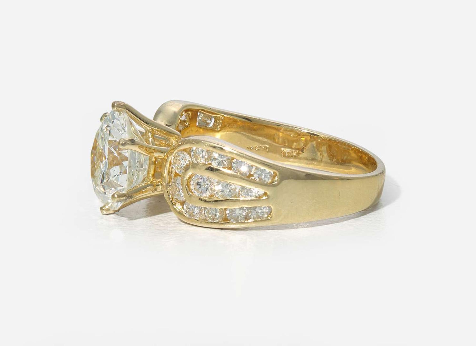 A Set of Matching 18K Yellow Gold and Diamond Earrings and Ring, 2.04 Carat Round Brilliant-Cut Diamond, GIA Certified