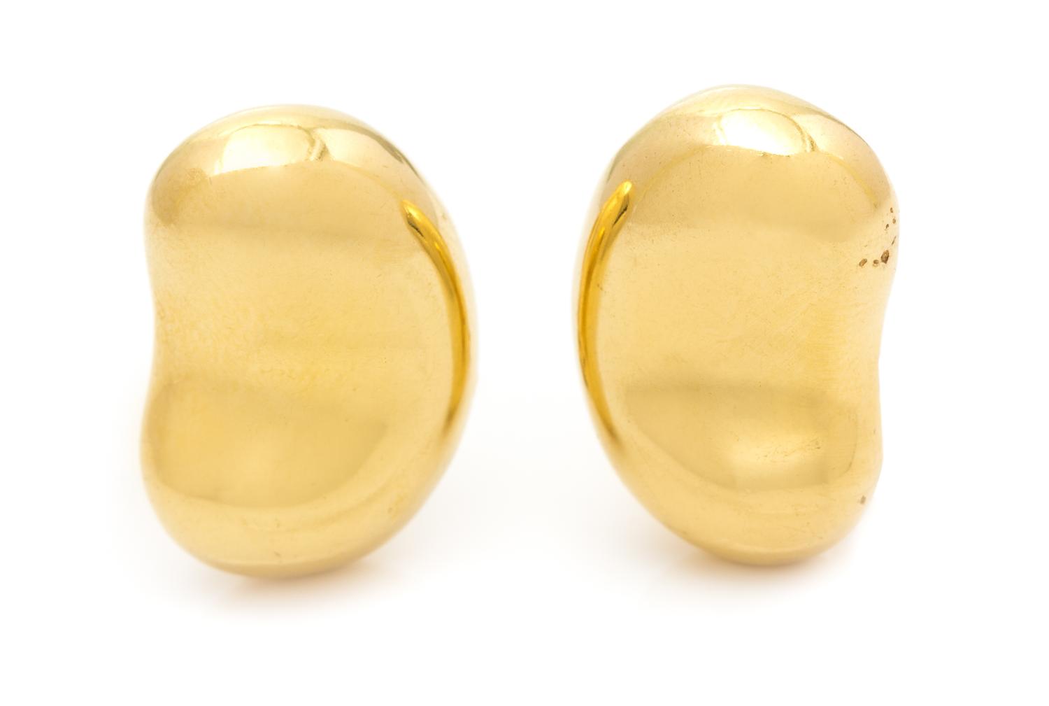 A Pair of 18 Karat Yellow Gold "Bean" Earclips, Elsa Peretti for Tiffany & Co., 11.00 dwts.
