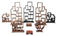A Group of Six Chinese Style Display Etageres Height of tallest 6 3/8 inches.