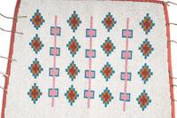 Northern Plains Beaded Hide Cuffs and Plains Cree Beaded Leggings